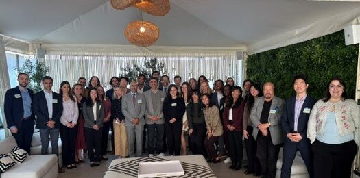 The faculty and attendees pose for a photo on Day 1 at the Huntley Hotel.